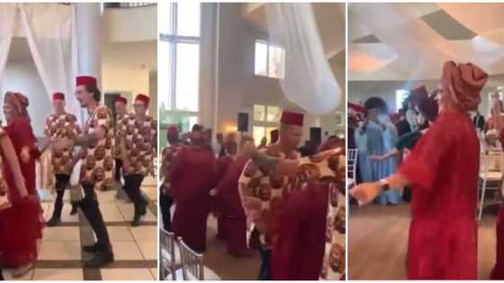 Oyinbo men and women in Igbo native wear cause stir at event as they dance to Flavour's song in hilarious clip