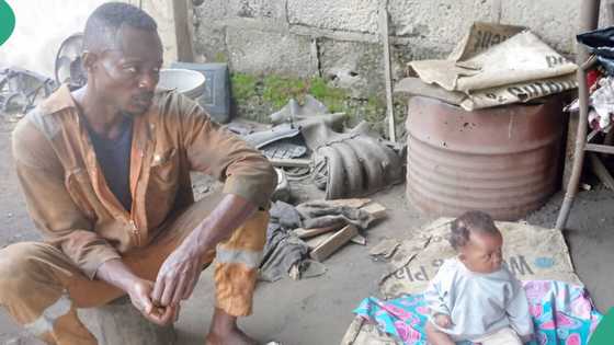 Car mechanic who takes 7-months daughter to workshop in Calabar says he's trying to get wife back