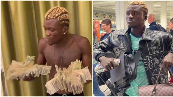 I don escape sapa: Portable shows off hundreds of foreign bills, brags about his new lifestyle