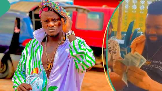 “You shall never lack”: Portable blesses man with foreign currency, sprays money on fans in videos