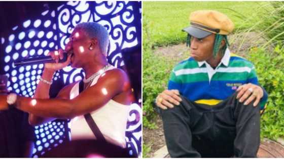 He dey smell or what: Funny reactions as students return singlet Bella Shmurda throws at them while performing