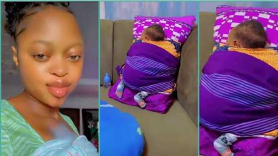 "This pikin dey show me shege": Nigerian mum ties her baby to pillow in video, people react