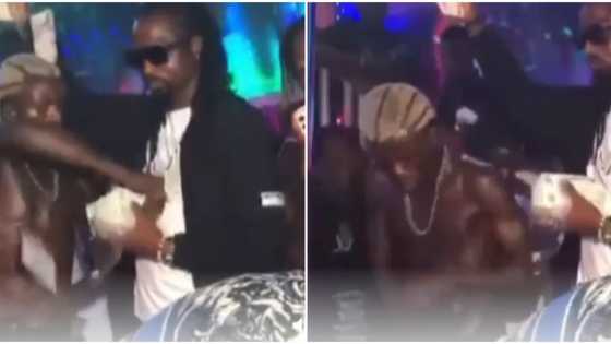 Zazu crooner Portable snatches money from man spraying him slowly in club, singer stuffs cash into his pants