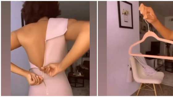 Style hacks for single ladies: Hilarious reactions as lady uses cloth hanger to zip dress up