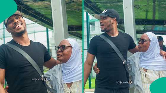 No place like home: Odion Ighalo’s mom bursts with joy as her son returns to Naija