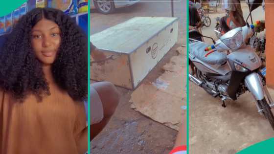 Nigerian woman gets ladies' bike, it comes in big box, men arrange it for her