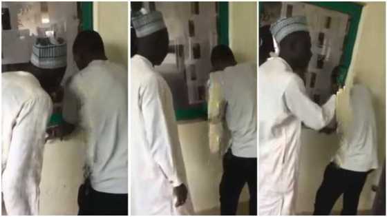 Tension in the air as Nigerian father follows his son to check results on school's notice board