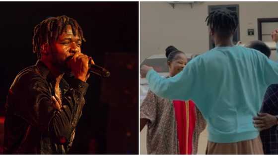 Singer Johnny Drille gets emotional as mum, dad other family members leave his house after spending few days
