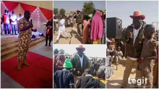 Kind Nigerian soldier makes out time, spends Christmas with poor kids in war-torn state, gives them gifts