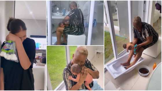 Omashola’s oyinbo fiancée gets emotional as BBN star’s mother bathes their newborn son the African way