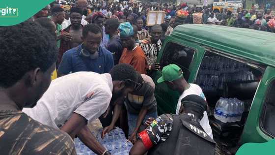 Hunger protests: Police share water to demonstrators in Lagos, video, photos emerge