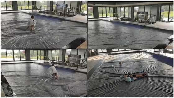 Father covers home swimming pool as safety measure, his child walks over it, plays without falling in video