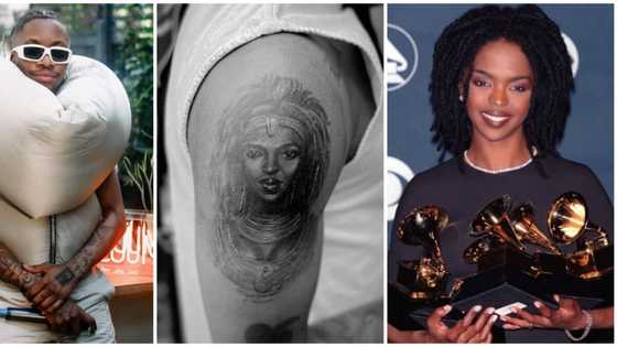 "Everybody dey find Grammy": Oxlade gets massive tattoo of American singer Lauryn Hill on his arm, photo trends