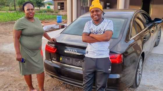 Young man buys his mum stunning Audi to thank her for keeping him in school