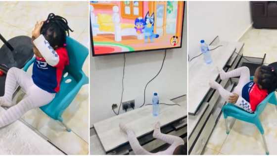 My kid sister stopped us from using the TV, Nigerian laments, shares video of the stubborn girl seeing cartoon