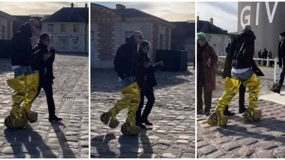 Video of man struggling to walk in huge gold boots sparks reactions among fashion lovers