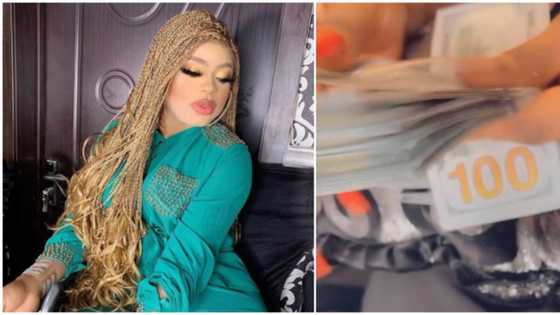 Bobrisky says as he shows off dollar bills says, 'If you want to be a runs girl, be an expensive one'
