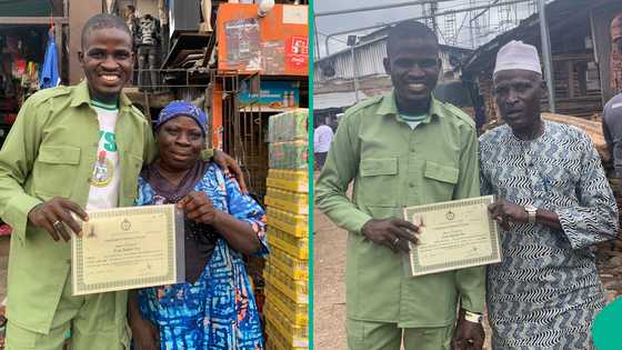Son of plank seller honours parents as he completes NYSC, displays certificate
