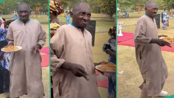 "Food na your mate?" Strong old man dances with plate of jollof rice in his hands, video trends