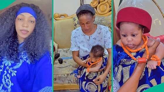 Grandma makes first grandson rock kingly attire in video, wears him fine beads, red cap