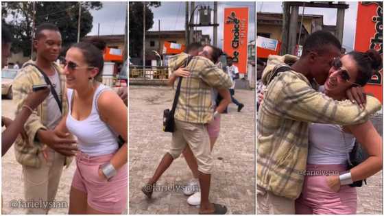 Nigerian man sees oyinbo lady on the street, hugs her tight, attempts to quickly kiss her in viral video