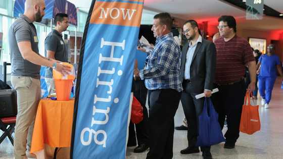 US hiring slows less than expected, unemployment unchanged