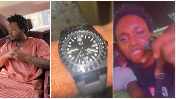 Olamide surprises fan who flows with his songs during performance, gifts him N2.4 million wristwatch
