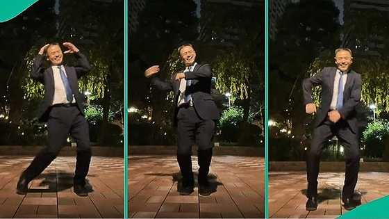 Japanese man in suit jumps on Dodo challenge, dances to Davido's song with crazy moves, people react