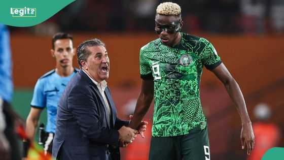 Nigerian players walk into their stadium camp in Bouke before the AFCON semi-final