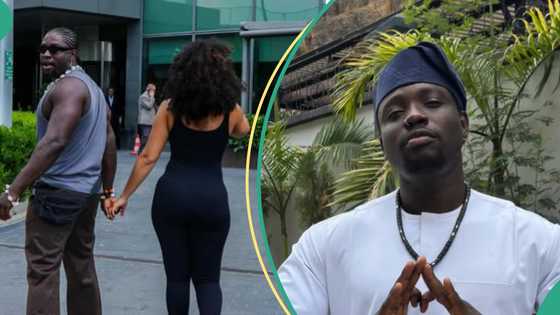 Verydarkman and Oyibo mystery woman kiss on TikTok live, fans catch glimpse of her face: “She fine o”