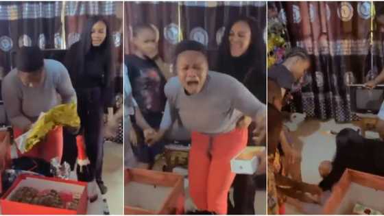 Reactions as woman who sacrificed a lot for siblings faints after being gifted iPhone during surprise birthday party