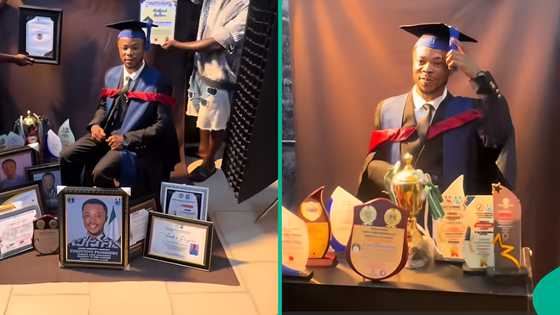 UNIPORT SUG president displays certificates and awards as he graduates from institution