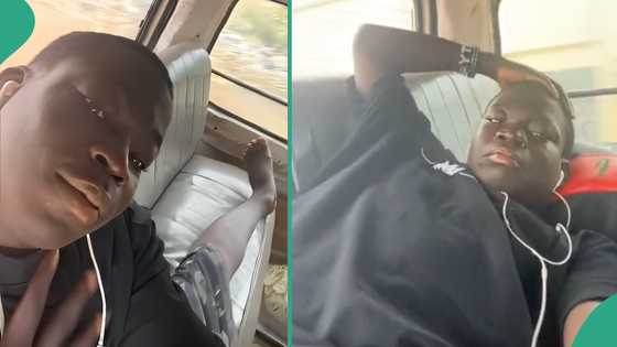 Young boy travelling from Lagos to Abeokuta relaxes in bus after paying for all back seats