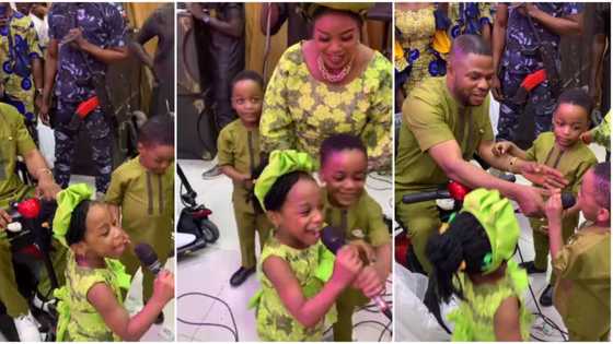 Yinka Ayefele looks on proudly as triplets seize microphone from musician and start singing at birthday party