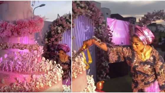 “All cake, no plastic”: Bobrisky cuts his giant cake at N400m housewarming party in video, fans praise him