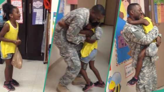 Little girl stares at soldier dad like she's seeing a ghost, hugs him in video during surprise visit