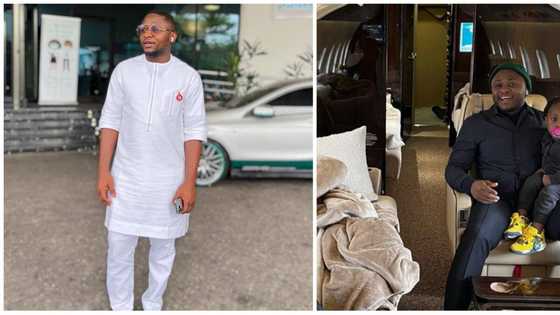 Are you a nanny now? Nigerians drag Ubi Franklin over photo of him carrying Davido's Ifeanyi, he responds