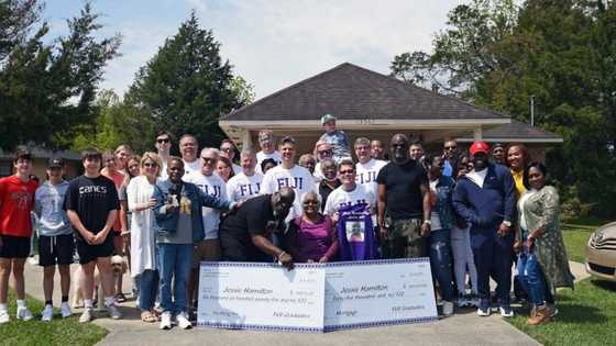 Alumni surprise their university's 74-year-old ex-cook on her birthday by paying off her mortgage