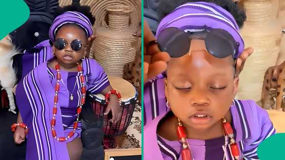 1-year-old girl shows swags in aso-oke birthday outfit, sleeps during photoshoot: "She's so cute"