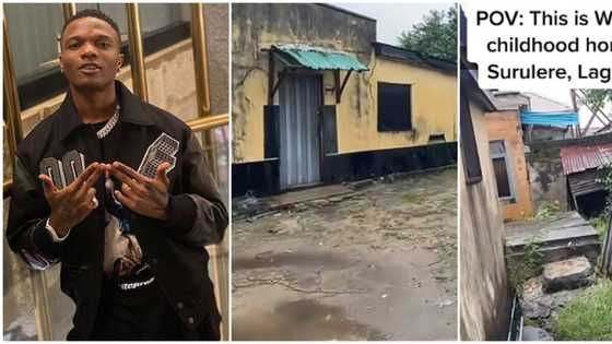 Video shows small Surulere bungalow with peeled paintings, grassy surroundings where Wizkid lived as a child