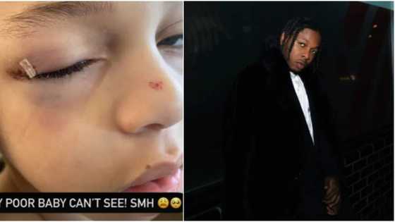 "My poor baby can't see": Runtown's baby mama cries out as singer's son injures his eye while playing