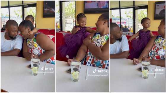 "I did it": Mum and dad kiss in kid's presence, she smiles, hugs her parent tight in video