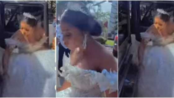 Bride rocks expensive ball wedding gown, struggles to come down from her exotic Mercedes GLK ride