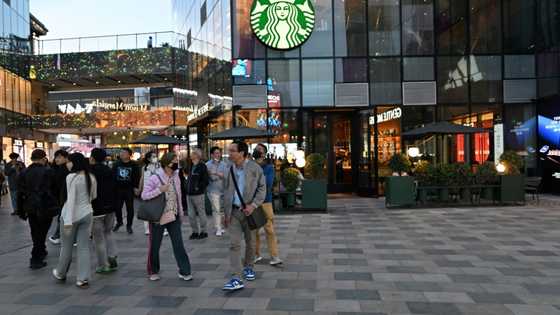 Starbucks receives bids for stake in China business: US media