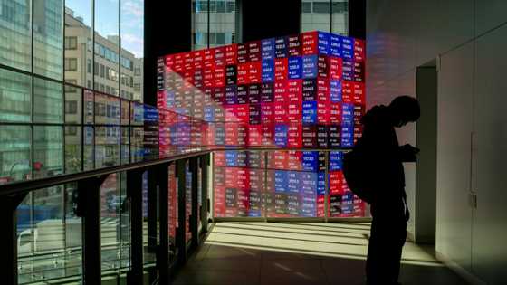 Asian markets drop with Wall St as tech fears revive