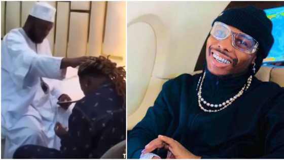 “Asake na Muslim?” Fans react to viral video of alfa putting hand on singer’s head and praying for him