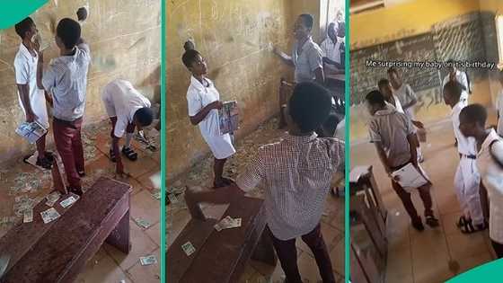 Drama as secondary school boy rains cash on female student, video gets attention online
