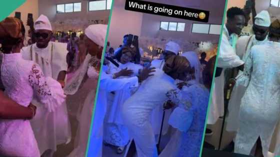 Bride confused as lady takes over groom on wedding day, stops him from dancing with her in video