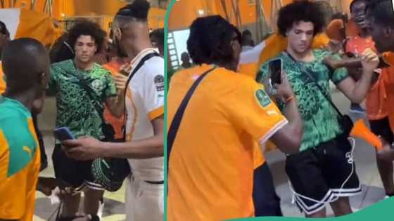 AFCON: Happy Cote d'Ivoire fans mob white man rocking Nigerian jersey, refuses to let him be