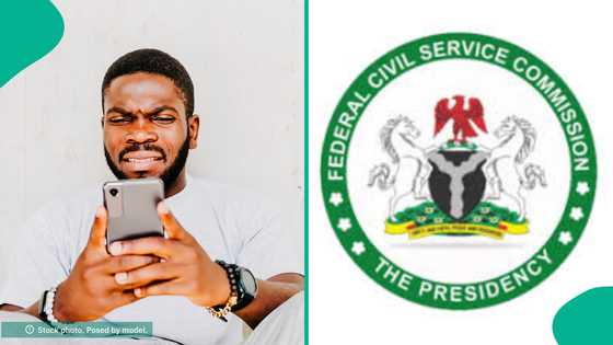 Federal civil service recruitment: Man displays message he got after submitting application